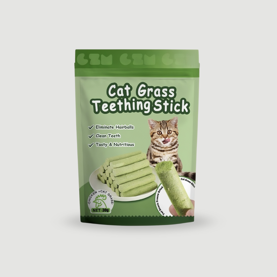 Green package of cat grass teething sticks with a cat on the label
