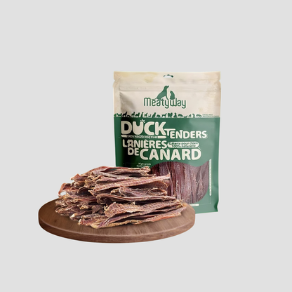 Bag of MeatyWay duck jerky on a wooden board with a white background